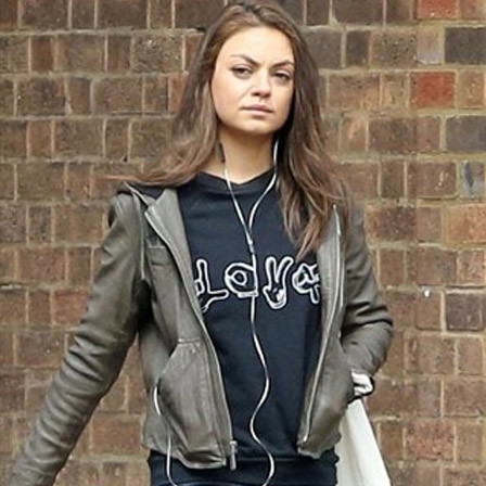 Mila Kunis Without Makeup Ear Plugged 