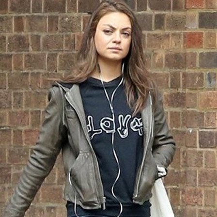 Mila Kunis Without Makeup Ear Plugged 